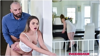 Athena Faris gives a fellate blow-job to her step-father under the table